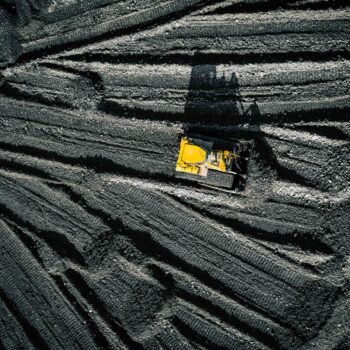 Open pit mine. Aerial view of extractive industry for coal. Top view. Photo captured with drone.