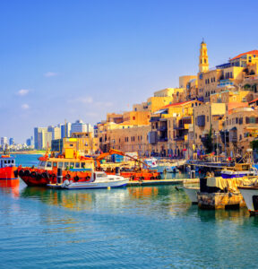 Old town and port of Jaffa and modern skyline of Tel Aviv city, Israel