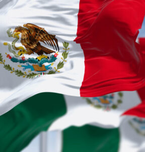 Three Mexican national flags waving in the wind